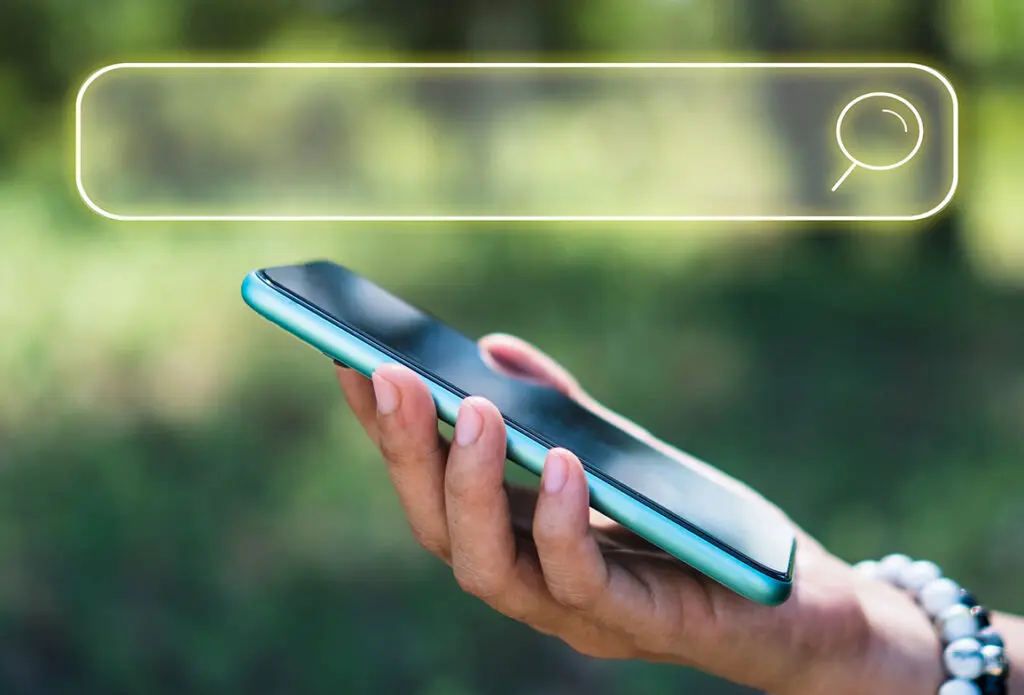 person using smartphone for voice search