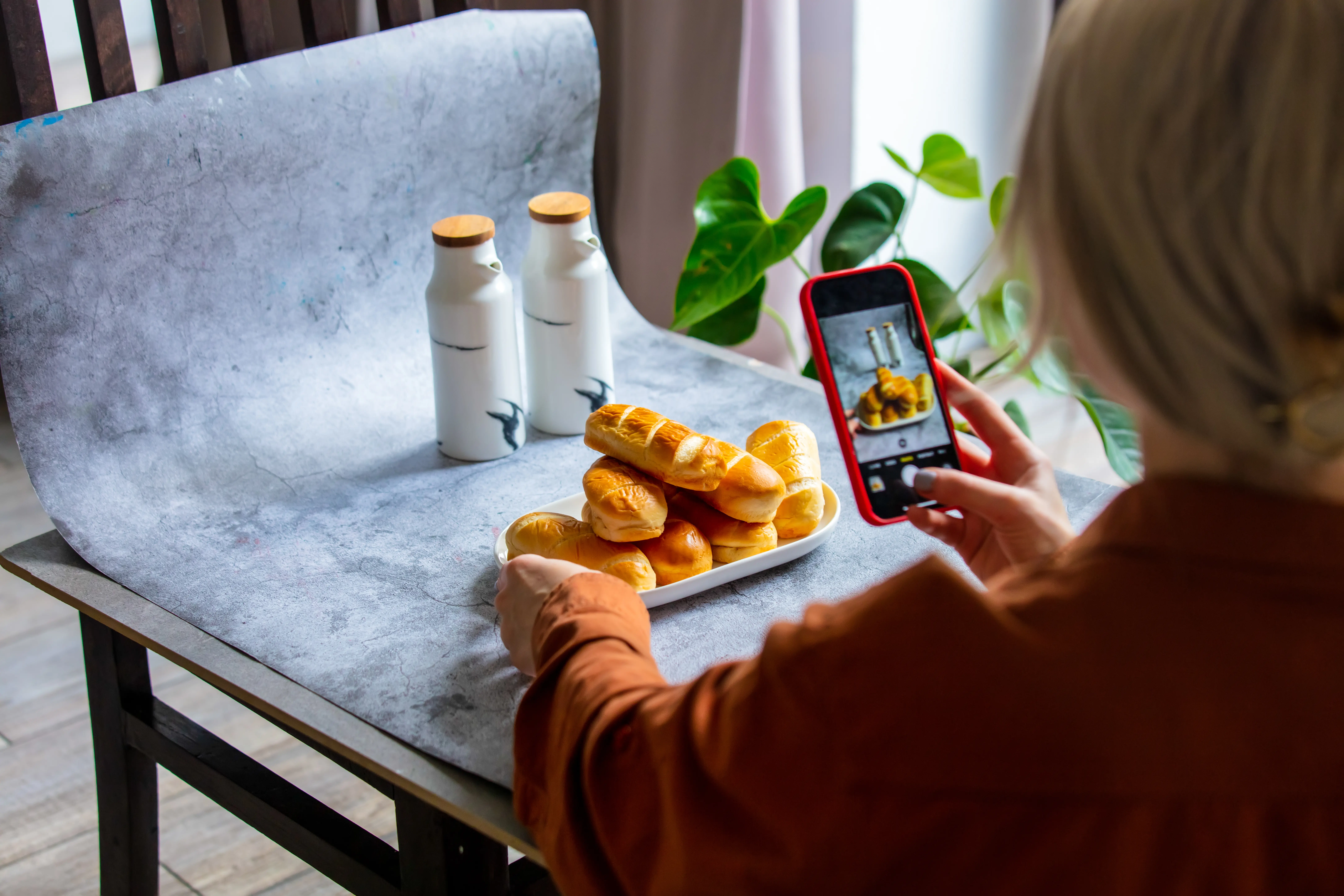 Woman make a photo of product for selling online