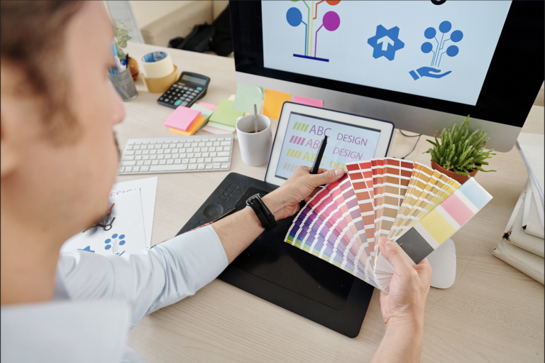 Graphic Designer choosing color for logo design