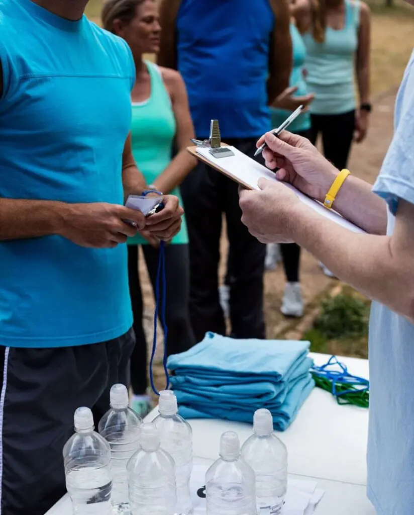 Event registration table at a marathon.