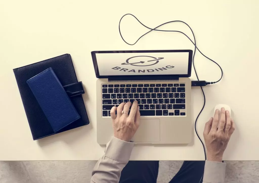 laptop with branding graphic