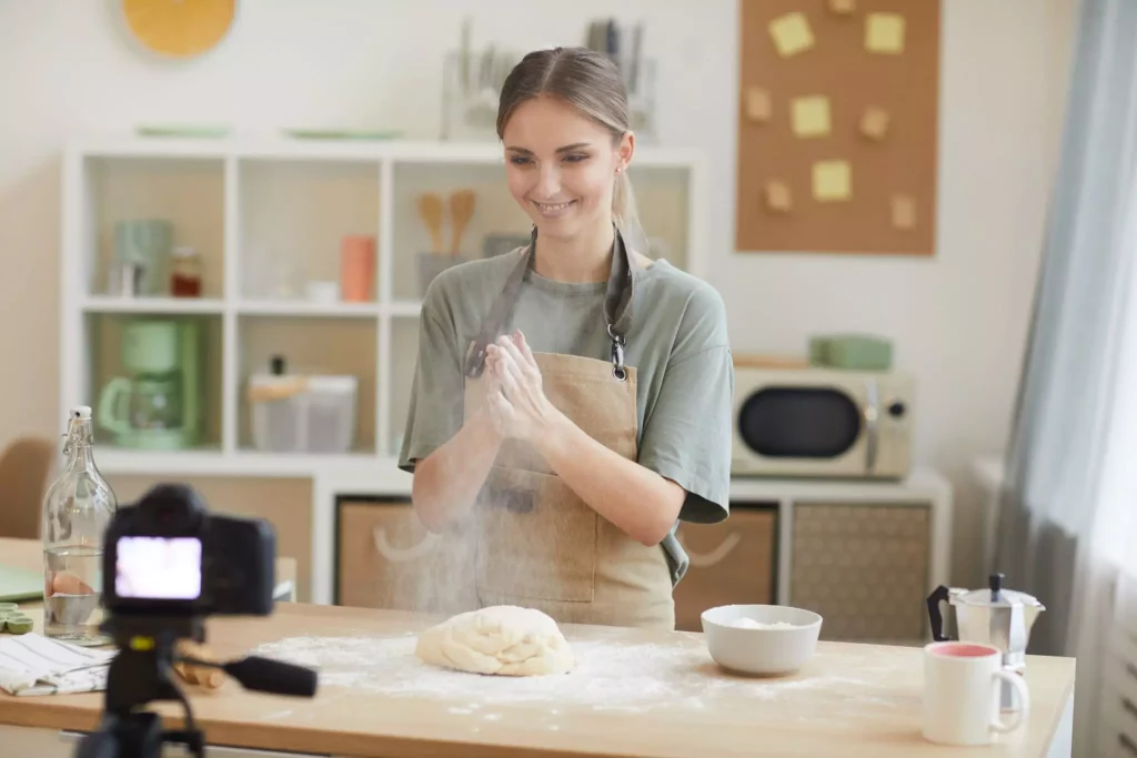 woman making dough while camera is recording