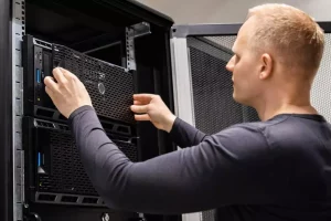 man operating large server