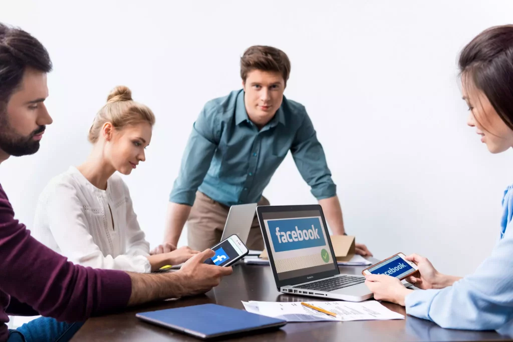 Young Business people using social media on devices