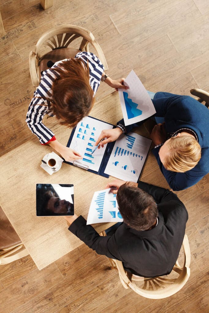 Group of Business People Analyzing Their Company