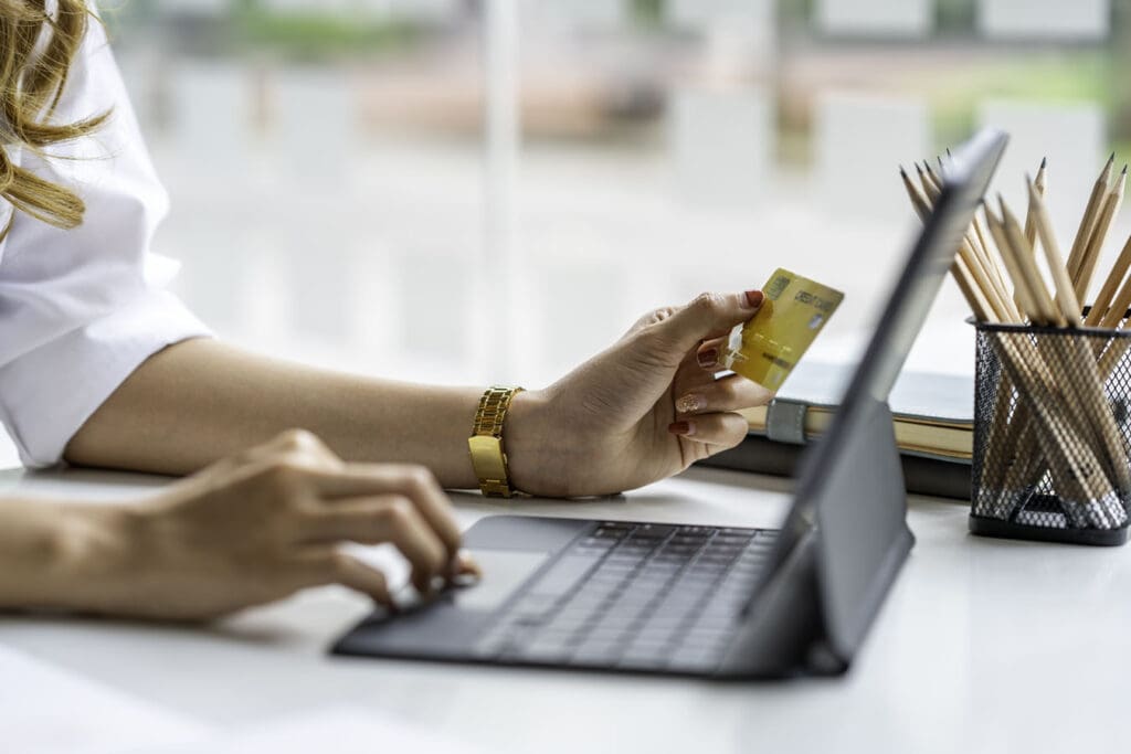 Woman making an online payment with a credit card