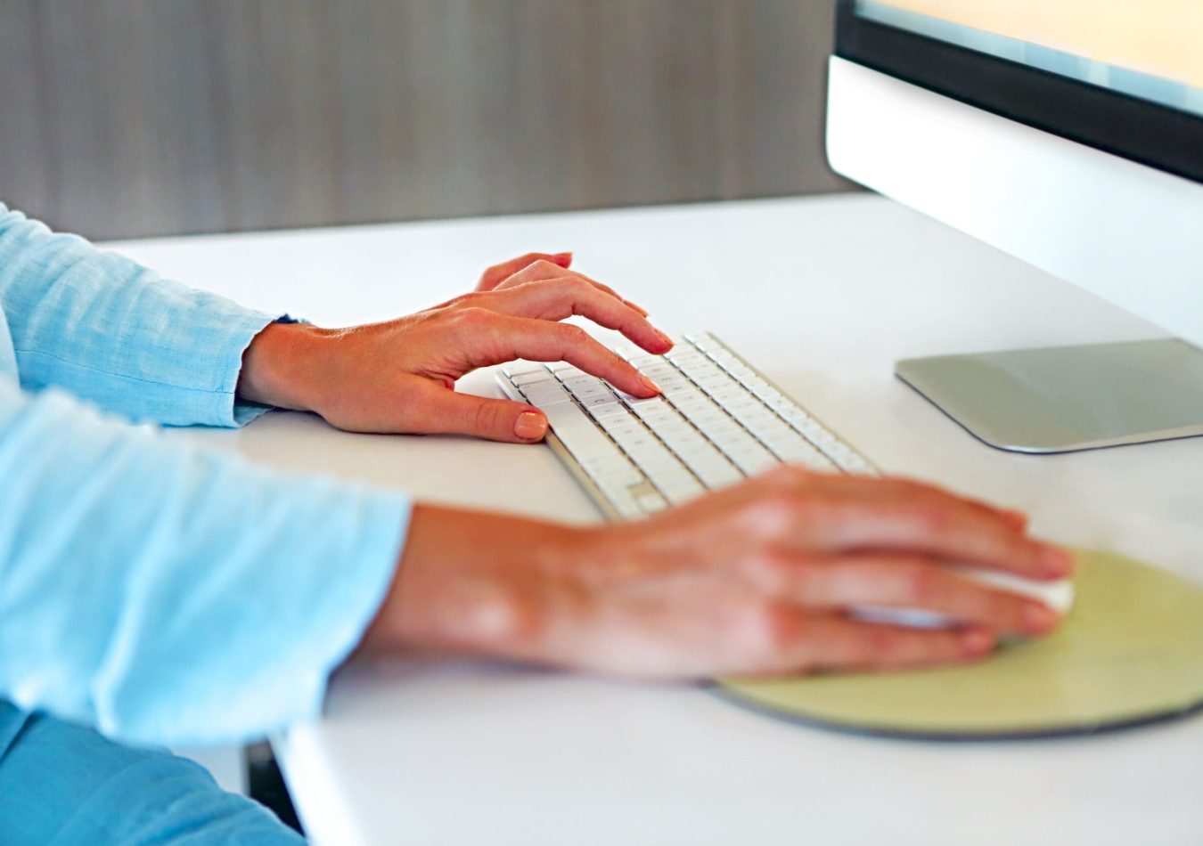 Young caucasian woman with computer close up
